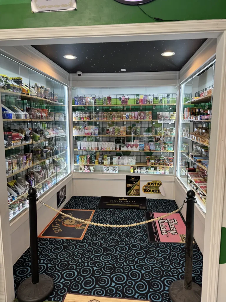 Glass display at The Botany Bay Richmond KY head shop stocked with wraps, blunt cones, rolling papers, and smoking accessories from brands like King Palm and Zig-Zag.